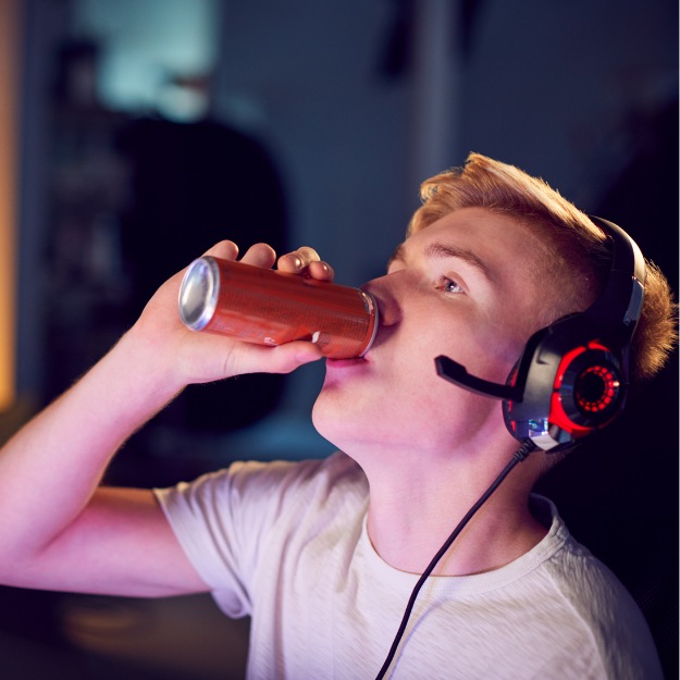 teenager drinking energy drink